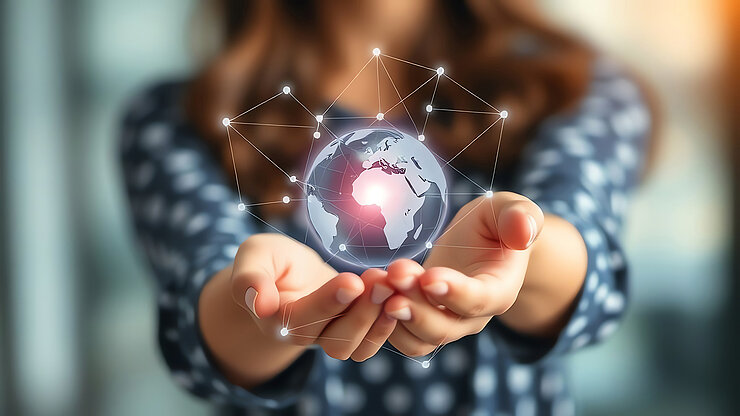 Global network in woman's hands concept