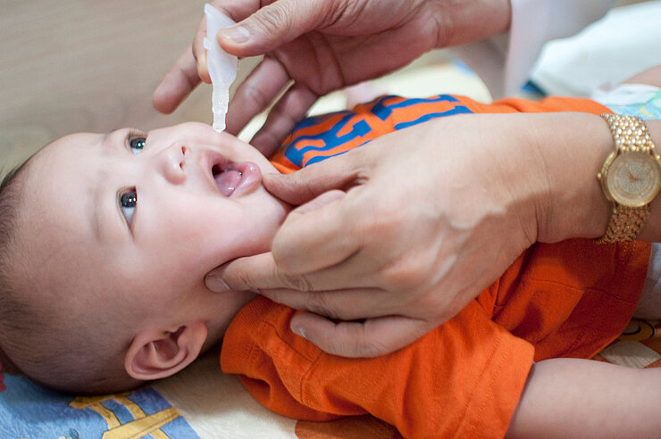 Oral vaccination of an infant